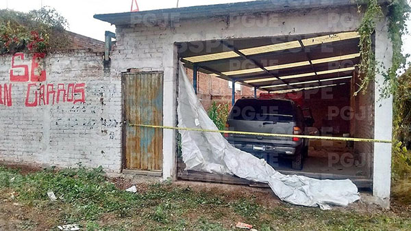 Encuentran bodega usada para autos robados